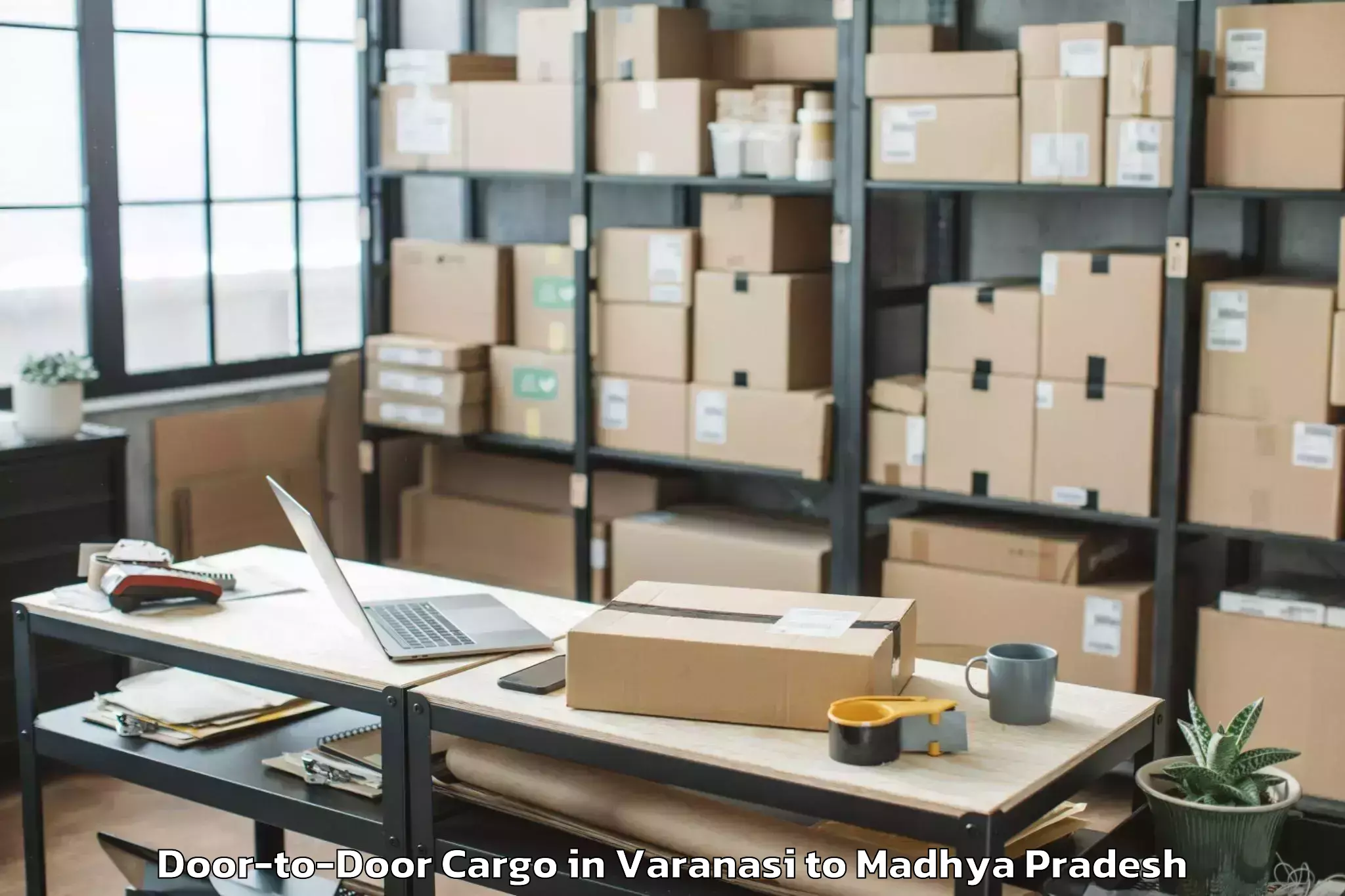 Professional Varanasi to Mhow Door To Door Cargo